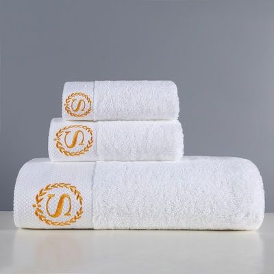 Logotipo personalizado Hotel de cinco estrellas Toallas de casa de huéspedes blancas en materialización de algodón puro