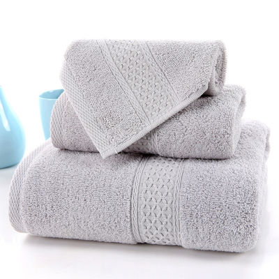 Toallas para el hogar absorbentes de algodón puro de tres piezas con rejilla beige y color sólido