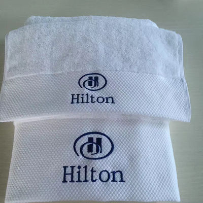 Tejido de algodón 100% de color sólido Logotipo personalizado Toallita de baño para baño de hotel de lujo