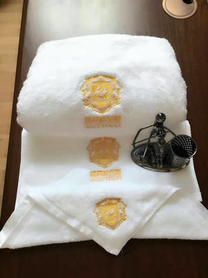 Tejido de algodón 100% de color sólido Logotipo personalizado Toallita de baño para baño de hotel de lujo