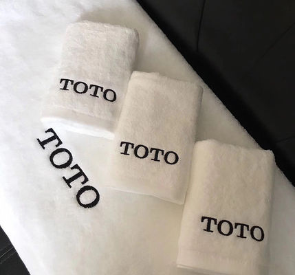 Tejido de algodón 100% de color sólido Logotipo personalizado Toallita de baño para baño de hotel de lujo