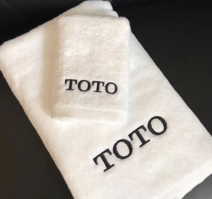 Tejido de algodón 100% de color sólido Logotipo personalizado Toallita de baño para baño de hotel de lujo