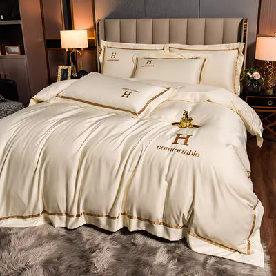 Home Poliéster de lujo bordado ropa de cama de seda de lavado Conjunto con cubierta de edredón de color sólido