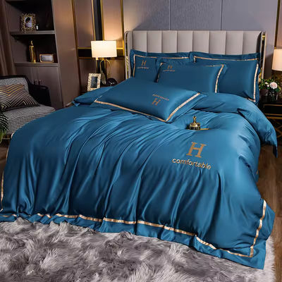 Home Poliéster de lujo bordado ropa de cama de seda de lavado Conjunto con cubierta de edredón de color sólido
