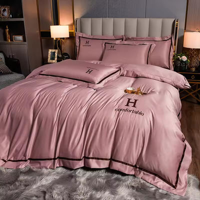 Home Poliéster de lujo bordado ropa de cama de seda de lavado Conjunto con cubierta de edredón de color sólido