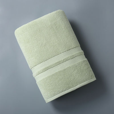 Conjunto de toallas de hotel de patrón de rayas engrosadas hechas de tejido de algodón puro para bañarse de lujo