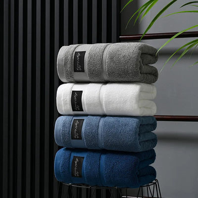 Set de toallas de hotel de lujo de algodón puro con patrón de rayas gruesas y diseño jacquard