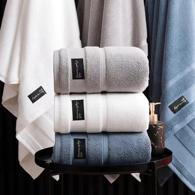 Conjunto de toallas de hotel de lujo bordado con patrón de rayas gruesas Jacquard Conjunto de toallas de baño para hotel
