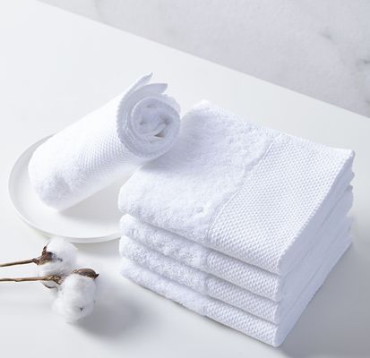 Hotel blanco personalizado exclusivamente para una toalla de baño espesa 100% de algodón absorbente