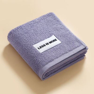 Toalla de mano fresca y simple hecha de algodón tejido suave perfecta para parejas de forma cuadrada