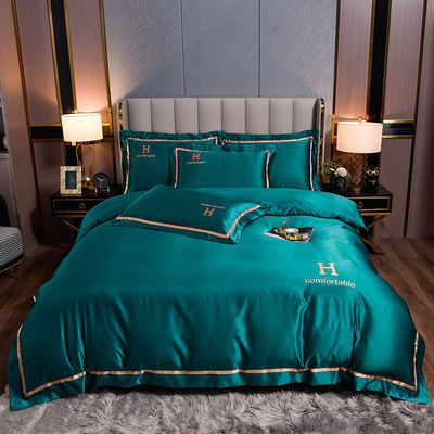 Logotipo personalizado de invierno bordado de poliéster lavado de ropa de cama sedosa conjunto para color sólido
