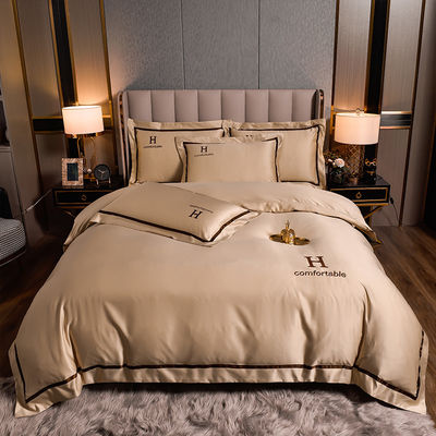Logotipo personalizado de invierno bordado de poliéster lavado de ropa de cama sedosa conjunto para color sólido