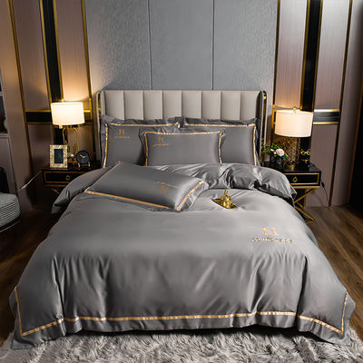 Logotipo personalizado de invierno bordado de poliéster lavado de ropa de cama sedosa conjunto para color sólido