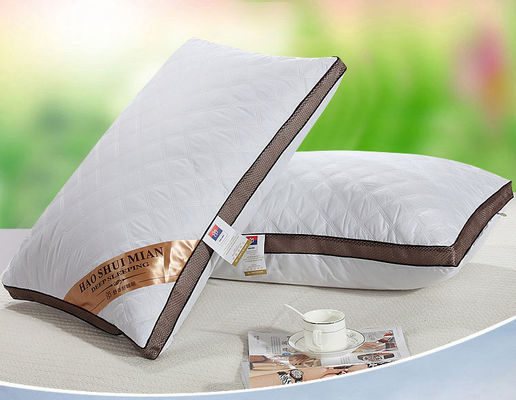 Almohada lavable de algodón puro de alta elasticidad Función sostenible para ropa de cama de hotel
