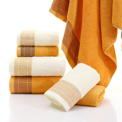 Toallas de hotel de algodón de bambú ultrablandas personalizadas para adultos tejidas de color sólido