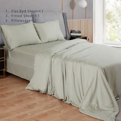 Cuatro piezas de ropa de cama de bambú liso teñido y desechable con impresión de color sólido