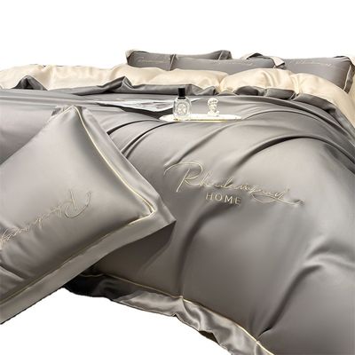Color sólido Luz de lujo bordado de seda lavada 4 piezas de ropa de cama