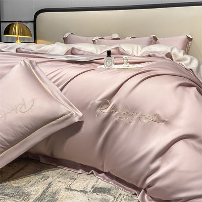 Color sólido Luz de lujo bordado de seda lavada 4 piezas de ropa de cama
