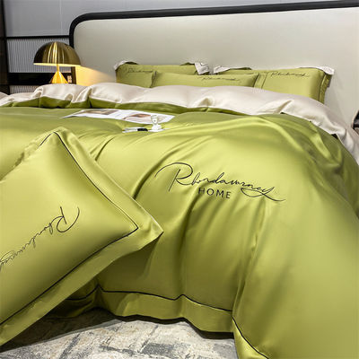Color sólido Luz de lujo bordado de seda lavada 4 piezas de ropa de cama
