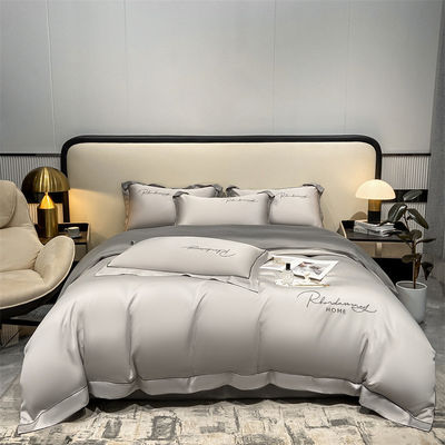 Color sólido Luz de lujo bordado de seda lavada 4 piezas de ropa de cama