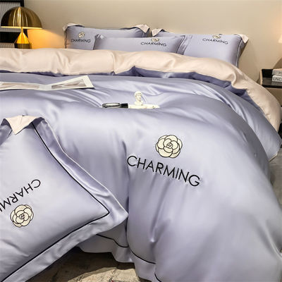 Color sólido Luz de lujo bordado de seda lavada 4 piezas de ropa de cama
