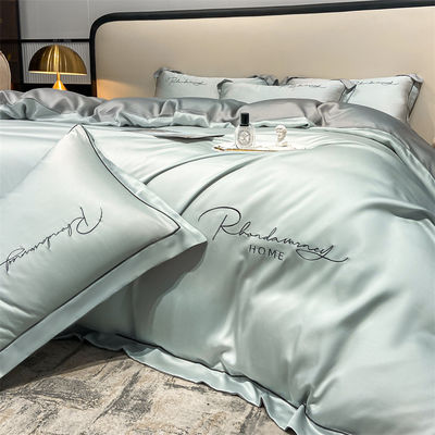 Color sólido Luz de lujo bordado de seda lavada 4 piezas de ropa de cama