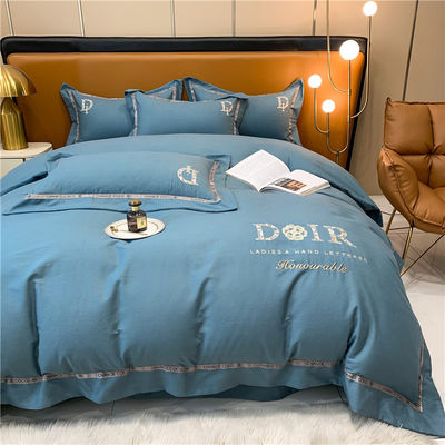 Setios de ropa de cama de algodón bordada para todas las estaciones.