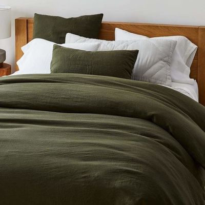 Un conjunto de ropa de cama 100% de lino francés para una experiencia de sueño acogedora y lujosa