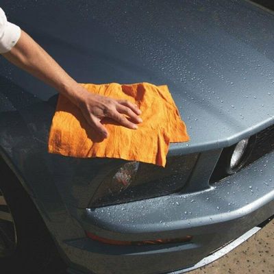 Limpia tu cocina sin esfuerzo con una toalla de secado naranja súper absorbente sostenible