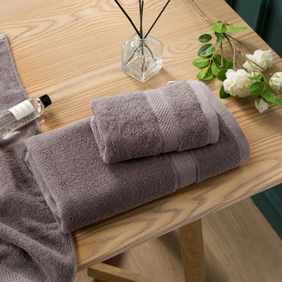 Hotel de 5 estrellas 100% de algodón para el baño con toallas de baño personalizadas y color sólido